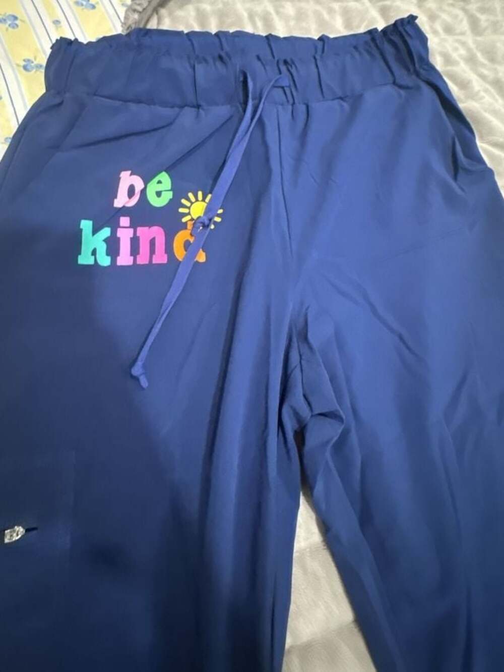 Shop Sunshine Sisters Be Kind Navy Blue Scrub Jogger Pants

Brand New